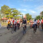 Sambut HUT Bhayangkara ke-75, Bupati Bolsel Gowes Bersama Kapolres