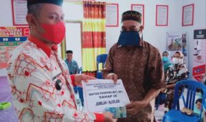 Pemdes Molosipat Salurkan BLT Dandes Tahap IX