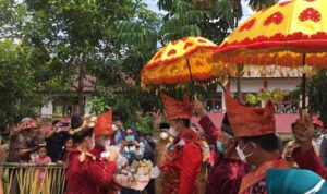 Bupati dan Wabup Bolsel Dijemput Adat Mongondow di Pinteng