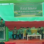 Pj Bupati Bolmong Hadiri Halal Bihalal di Desa Pangian Tengah