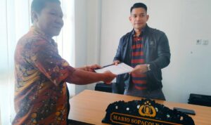 Polres Bolmut Resmi Terima Laporan Hasil Audit Desa Bolangitang Dua.
