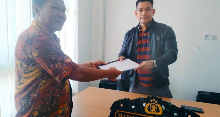 Polres Bolmut Resmi Terima Laporan Hasil Audit Desa Bolangitang Dua.